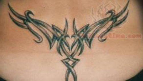 Tribal Mechanical Lower Back Tattoo